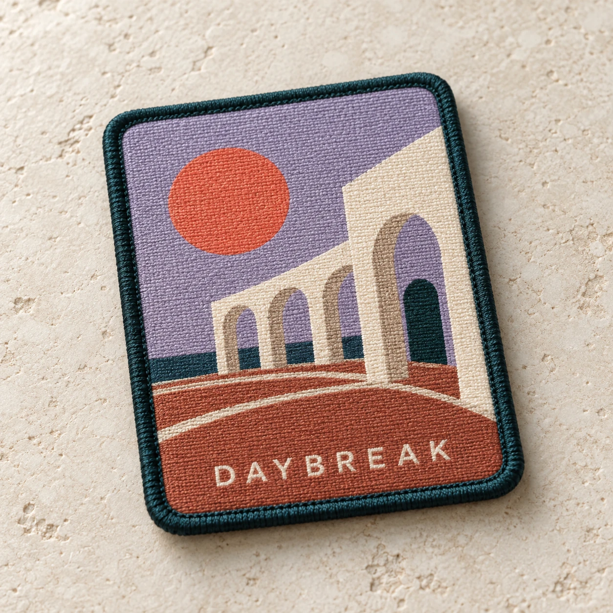 Flat woven patch artwork with a finished border