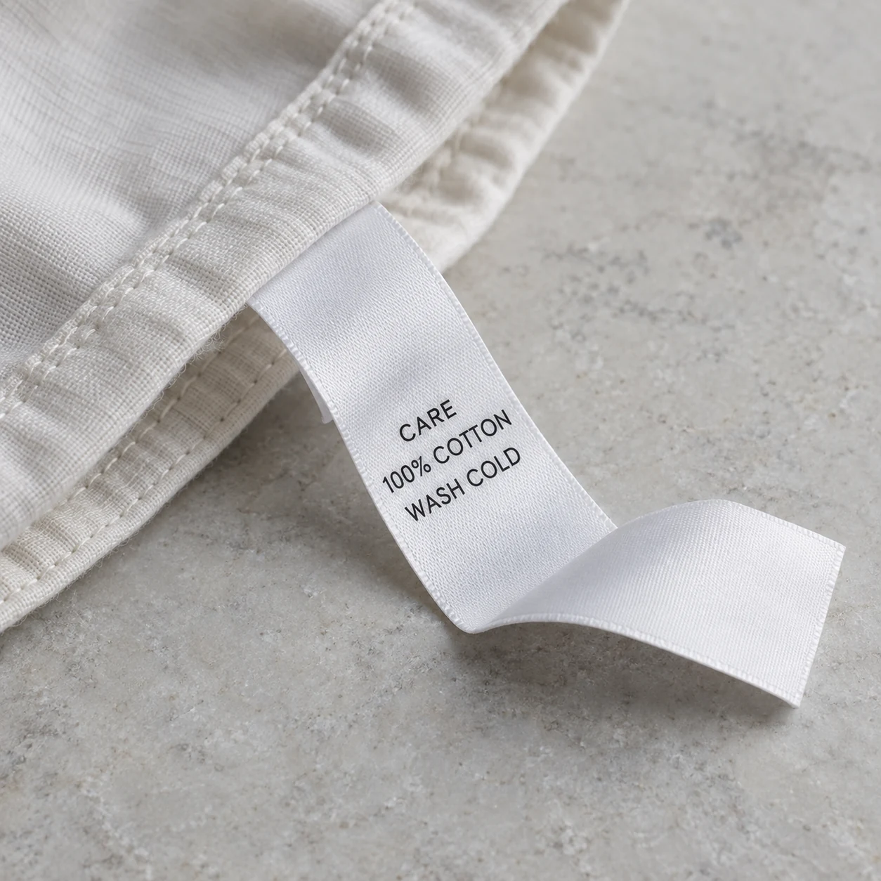 Printed care information on thin polyester tape