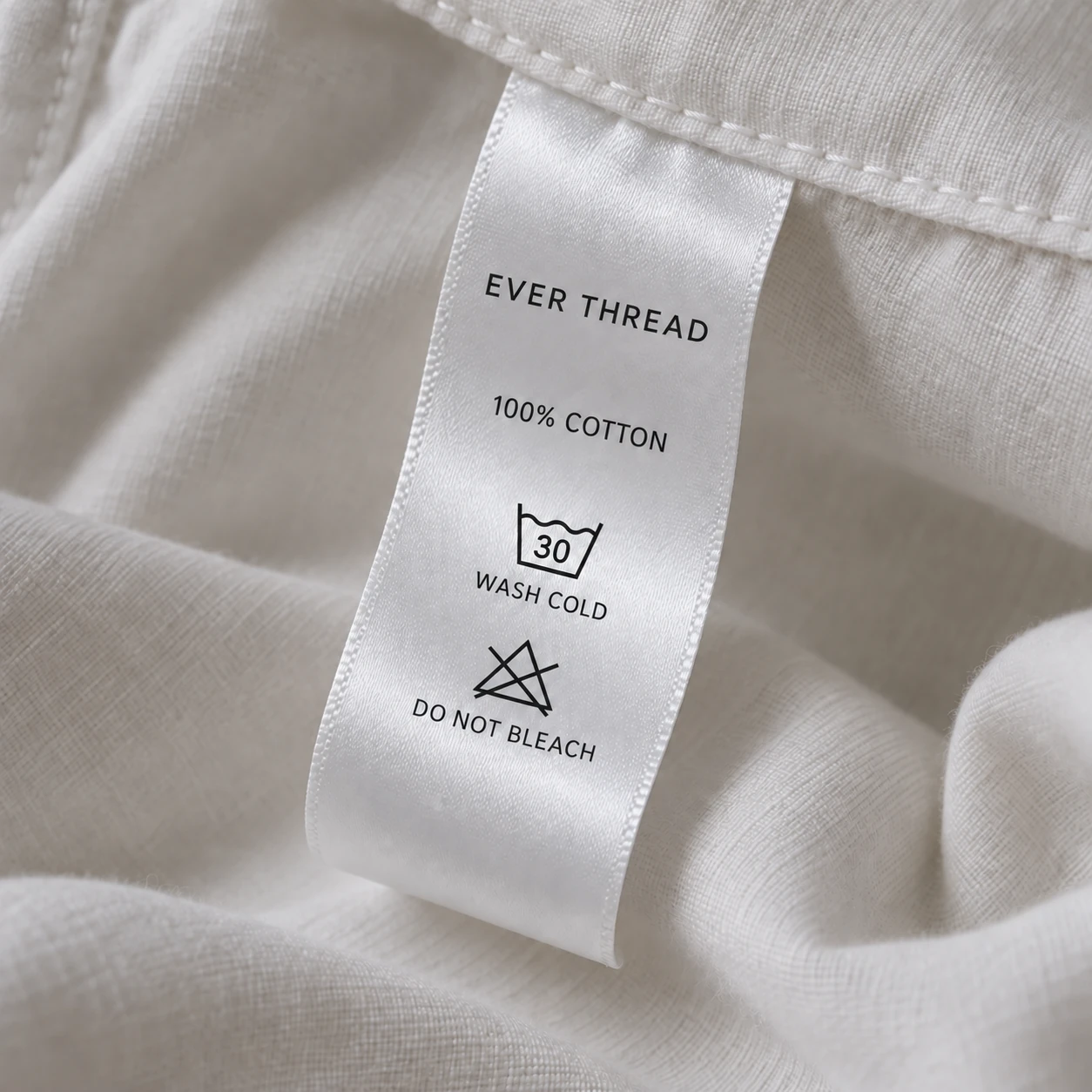 Concept photograph of a printed care label sewn into a garment